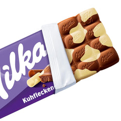 Milka Cow Spots – Chocolate con leche alpino con chocolate blanco con diseño de manchas de vaca – 24 x 90 g