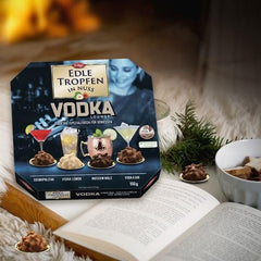 Edle Tropfen en Nuss Vodka Lounge 100g, bombones de chocolate rellenos de líquido con glaseado de chocolate con leche y crujientes trozos de avellana