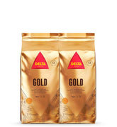 Delta Cafés - Kaffeebohnen Gold - 2 Pakete à 1 kg - Intensität 12 - Vollmundige Arabica-Röstkaffeebohnenmischung - Sehr aromatisch mit Noten von Honig und Reifen Früchten