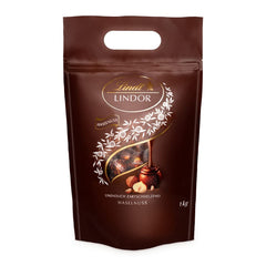 LINDOR bolas de chocolate con avellanas, bolsa de 1 kg + Johnnie Walker Sherry barrica 0,7 litros