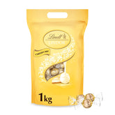 Chocolate Lindt | Bolsa de tarta de queso LINDOR | 1 kilogramo | 80 bolas de chocolate con leche blanco con relleno de tarta de queso que se derrite en la boca | Regalo de chocolate para compartir