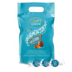 LINDOR bolitas de chocolate con caramelo salado | aprox. 80 bolas de chocolate con leche con relleno de caramelo salado | Paquete a granel y bolas de chocolate Marc de Champagne | 700 gramos