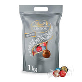 Chocolate Lindt | Bolso surtido LINDOR plata | Bolsa de 1kg | 80 bolitas de chocolate con leche que se deshacen en la boca, 70%, sabores de caramelo salado y doble chocolate | Regalo de chocolate para compartir