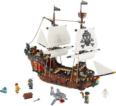 LEGO Creator Juego de Barco Pirata 3 en 1, Juguete con 3 Opciones de Construcción, Construye una Taberna Pirata o una Isla Pirata Calavera, Incluye 3 Minifiguras de Aventuras de Juego de Roles 31109 Juegos de Construcción Besuche den LEGO-Store