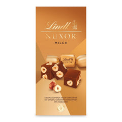 Chocolate Lindt | Bolsita chocolate con leche NUXOR | 103g | Cubitos cremosos de chocolate con leche de gianduja con avellanas tostadas | regalo de chocolate