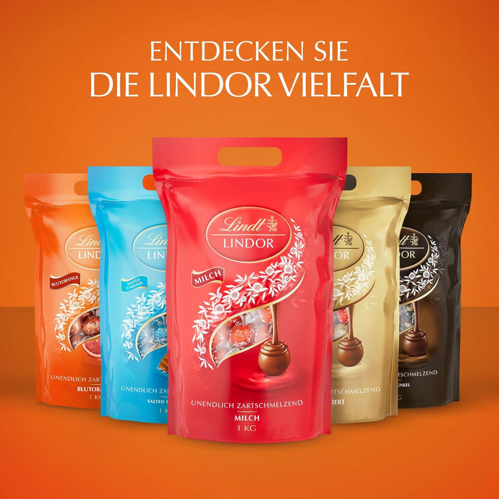Lindt LINDOR Bolas de chocolate rojo y naranja | Bolsa resellable de 1 kg | aprox. 80 caramelos de chocolate con relleno que se deshace en la boca | Paquete a granel, regalo de chocolate.
