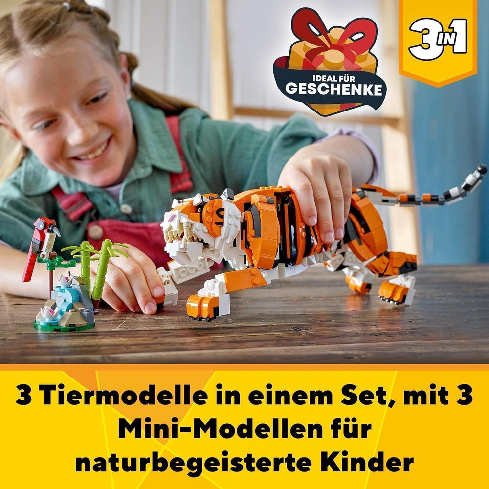 LEGO 31129 Creator Majestic Tigre, Panda o Pez Juego de figuras de animales 3 en 1 Juguete para niños Niños y niñas Juegos de construcción de juguetes de construcción de animales Besuche den LEGO-Store