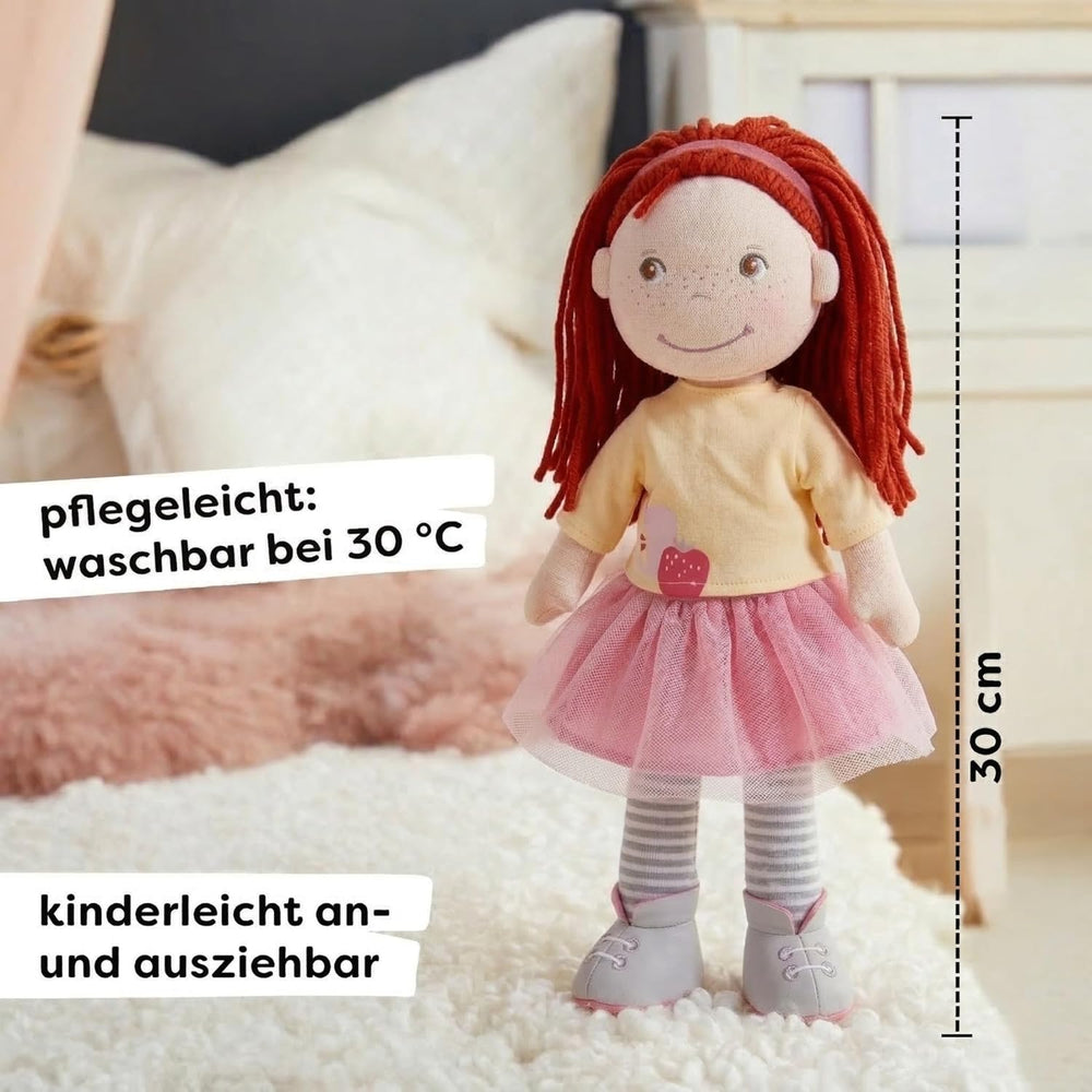 HABA Puppe AVA – Stoffpuppe für Kinder ab 18 Monaten, 30 cm, weicher Körper & pflegeleicht, Gesicht gestickt, Kleidung mit Klettverschluss – 1307196001