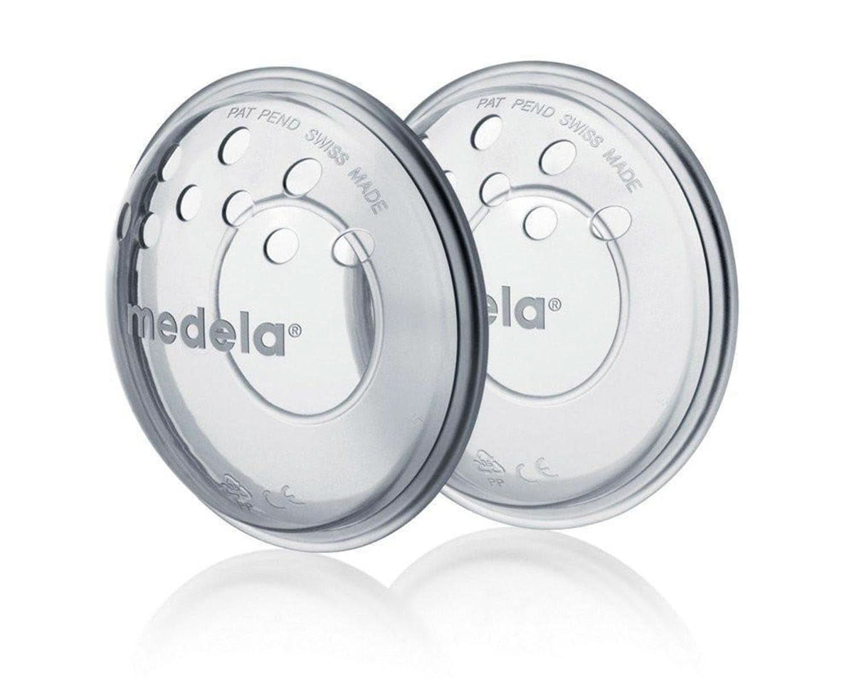 Protectores para pecho Medela - Sin BPA, de silicona suave, con orificios de ventilación transpirables, incluye 2 protectores Accesorios Alimentación y Lactancia Bebe Naty Shop