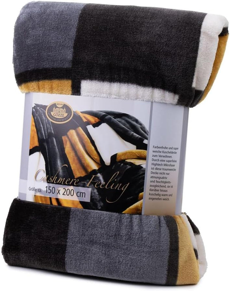 Gözze - Manta suave y cómoda, sensación de cachemira, tejido pesado 500 g/m², Antigua, 150 x 200 cm - Camas y mantas mostaza/negro/blanco Besuche den Gözze-Store