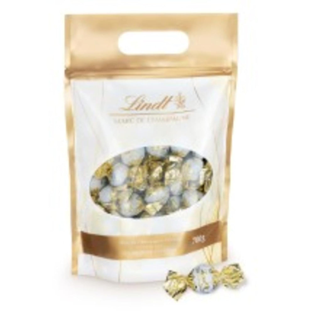 Bolas de chocolate Lindt Marc de Champagne | 700 gramos Aprox. 56 caramelos de chocolate con leche con relleno refinado, contiene alcohol | Paquete a granel | Regalo de chocolate | regalo de chocolate
