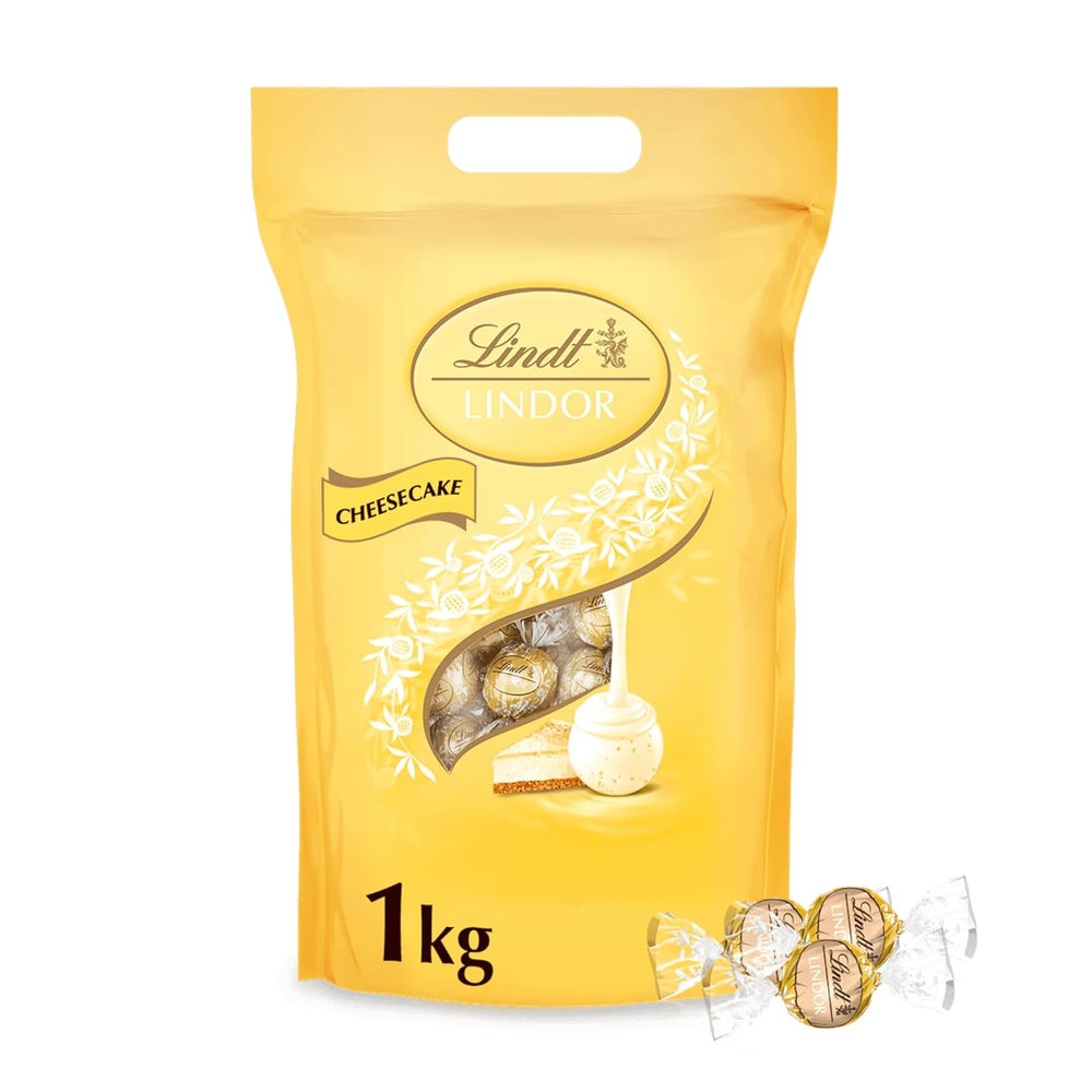 Chocolate Lindt | Bolsa de tarta de queso LINDOR | 1 kilogramo | 80 bolas de chocolate con leche blanco con relleno de tarta de queso que se derrite en la boca | Regalo de chocolate para compartir