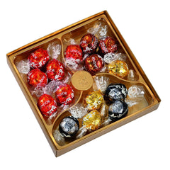 Caja de regalo Lindt LINDOR con bombones surtidos, aprox. 15 trufas LINDOR, 4 variedades (chocolate con leche, chocolate blanco, chocolate negro 60% y avellana), 187 g