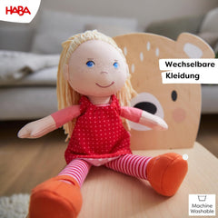 HABA Stoffpuppe Annelie – Weiche Puppe mit Haaren zum Stylen – Mit wechselbarer Kleidung – Ab 18 Monaten – 30 cm – Waschbar – 1302108001