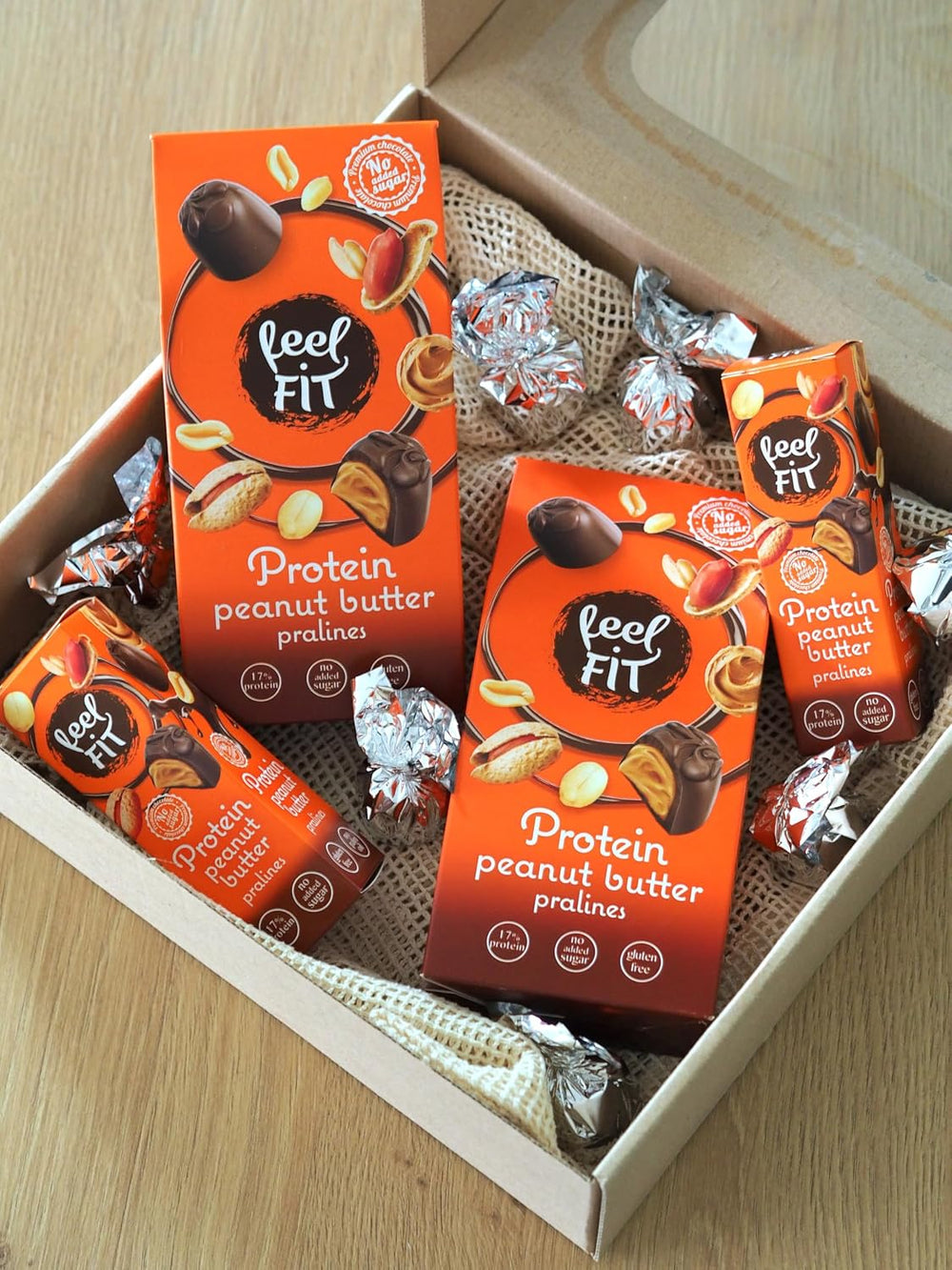 Pralinés proteicos de mantequilla de maní Feel FIT en chocolate con leche de alta calidad, sin azúcar añadido, 17% de proteína, sin gluten 66 g (paquete de 1)