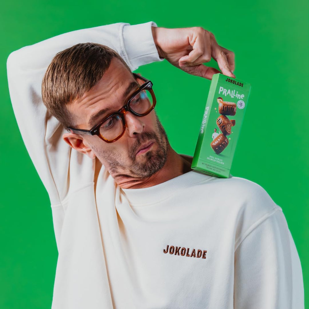 JOKOLADE PRALINÉ Caja 80g | Relleno generoso de crema de turrón de avellanas y chips | Chocolate de comercio justo de Joko Winterscheidt