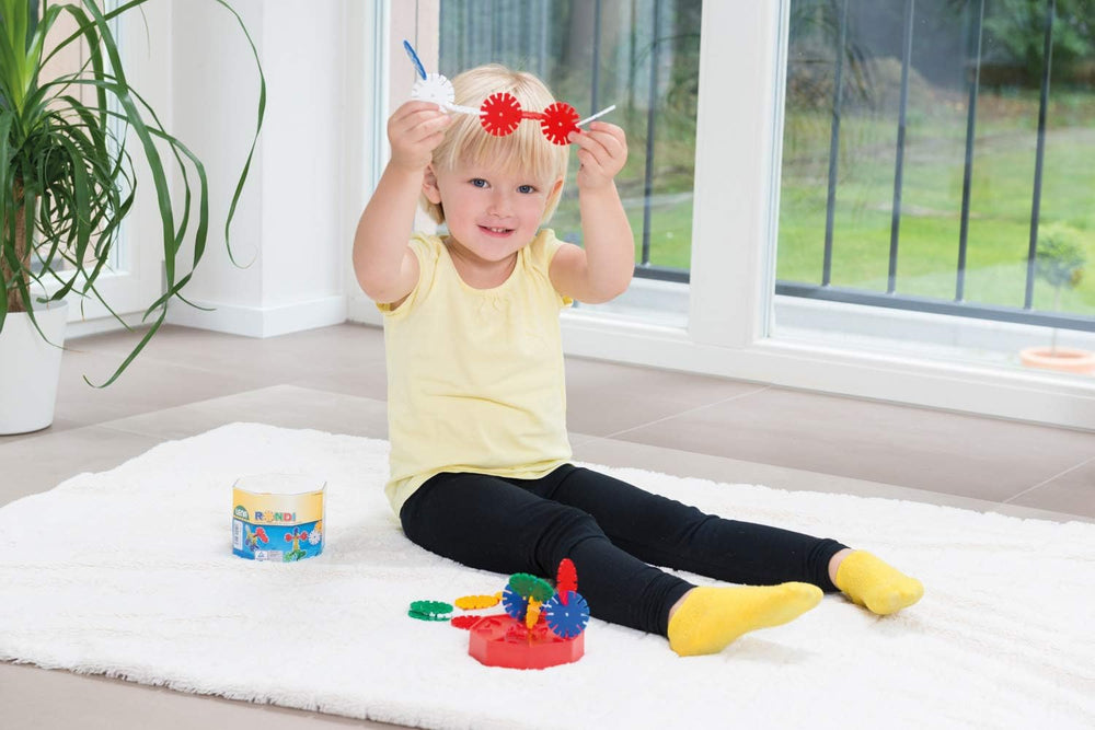 Lena 35946 Steckspiel Rondi 45 en Baudose, 55 Teile en bunten Farben, ca. 45 mm, de 3 años a 10 años, Konstruktionsspielzeug mit Steckteilen, Mehrfarbig