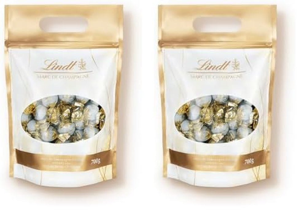 Bolas de chocolate Lindt Marc de Champagne | 700 gramos Aprox. 56 caramelos de chocolate con leche con relleno refinado, contiene alcohol | Paquete a granel | Regalo de chocolate | regalo de chocolate