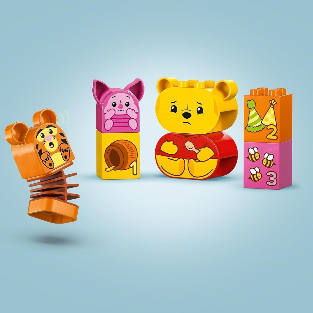 LEGO DUPLO - Fiesta de cumpleaños de Winnie the Pooh de Disney - juguete educativo para preescolares - juego de 3 minifiguras, incluidos Winnie the Pooh, Tigger y Piglet - idea de regalo para niños y niñas a partir de 1,5 años 10457 Juegos de construcción Beuche den LEGO-Store