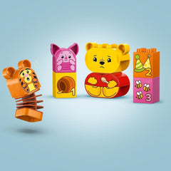 LEGO DUPLO - Fiesta de cumpleaños de Winnie the Pooh de Disney - juguete educativo para preescolares - juego de 3 minifiguras, incluidos Winnie the Pooh, Tigger y Piglet - idea de regalo para niños y niñas a partir de 1,5 años 10457 Juegos de construcción Beuche den LEGO-Store
