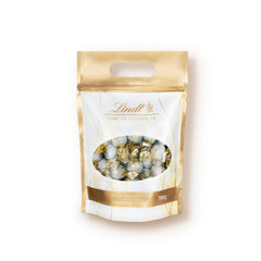 Lindt Marc De Champagne 56 bombones con leche entera y rellenos refinados que contienen alcohol 70 gramos Naty Shop Chocolates