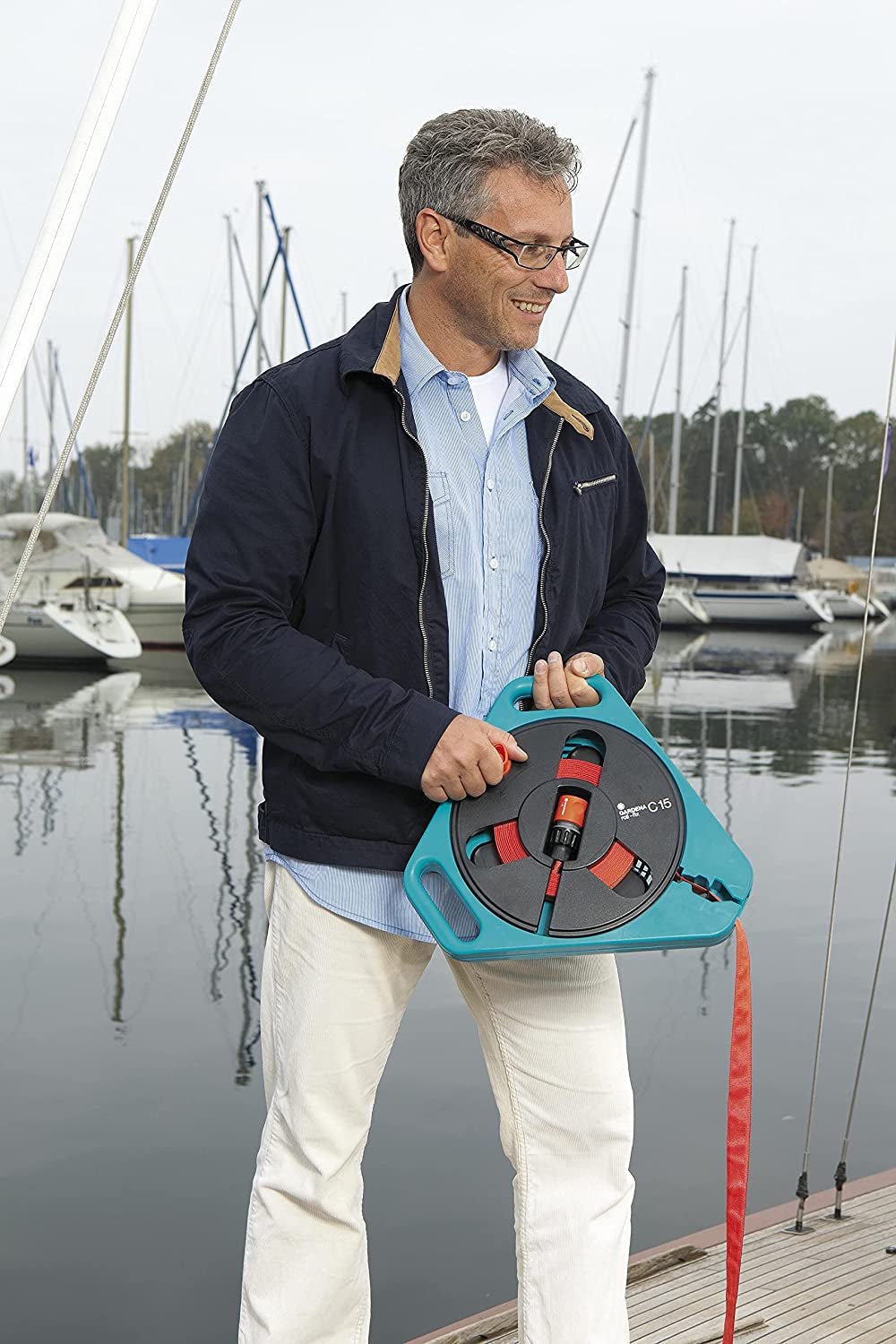 Furtun plat Gardena Original Classic roll-fix 15m: Casetă furtun economisitoare cu furtun de apă (Ø 12 mm în casetă), mecanism automat de siguranță, incl. duză de pulverizare, cu dispozitive de conectare (756-20)