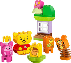 LEGO DUPLO - Fiesta de cumpleaños de Winnie the Pooh de Disney - juguete educativo para preescolares - juego de 3 minifiguras, incluidos Winnie the Pooh, Tigger y Piglet - idea de regalo para niños y niñas a partir de 1,5 años 10457 Juegos de construcción Beuche den LEGO-Store